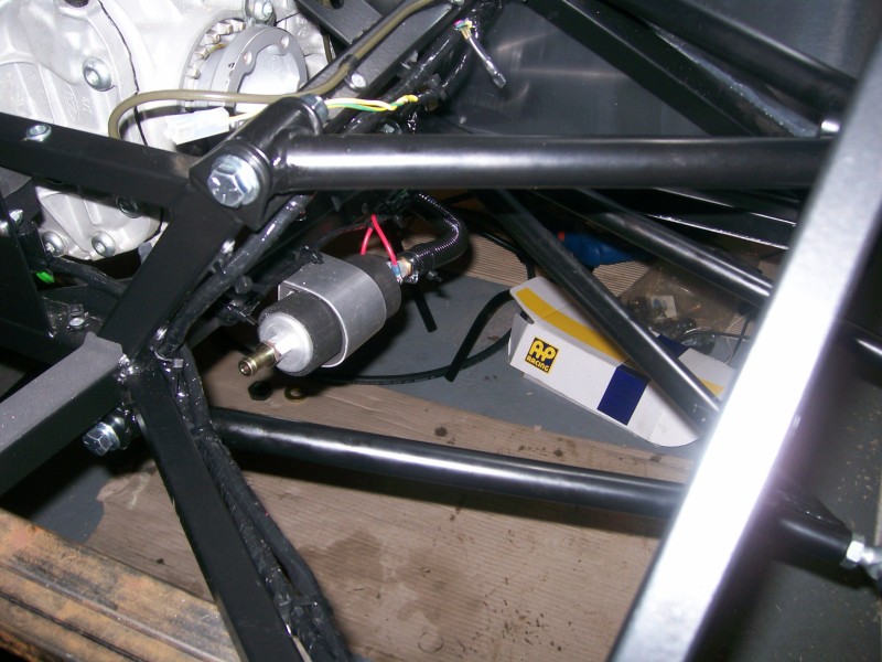 Reverse view of the fuel pump. Once the drive shafts are in we can secure the tank and connect the last two fuel hoses (and electricals).