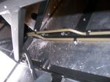 Careful not to block the seat mount holes with the second fuel line.