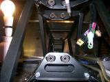 THe loom being fed from front to back, secured to the top of the transmission tunnel on the left hand side. The wires hanging down on the right is just the dash loom hanging down after being passed through the scuttle panel