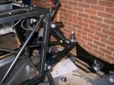 Lower ball joints fitted. We needed to buy longer bolts for this.