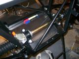The steering rack fitted into place with the clamps and rubber mounts.