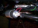 The pump connected to the loom and plumbed into the send line on the chassis.