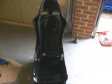 Seat secured to sub frame.