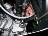 Matt Holding the bolt on the engine output flange whilst I torque.