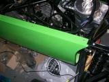 Main body panel fixed to chassis at the front.