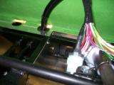 Holes cut into the scuttle to allow clearance of the steering column and the wiring loom grommets.