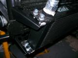 The problem with the radiator bracket - a big gap between brackets.