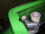 Tank filler neck taped up to stop it taking in dust.