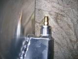 Fuel leak was coming from the gap between the tank and the silver boss (just below the bronze outlet).