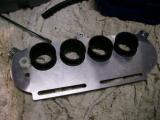 Air filter plate connected to trumpets.
