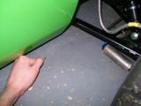 This shows just how low the front is - my fist is not even close to fitting under the car!