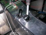 Gear and reverse lever holes after covering
