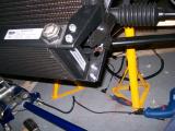 Brackets fitted to oil cooler, both brackets fit above the oil cooler itself.
