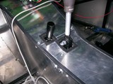 Gear and reverse lever holes after covering